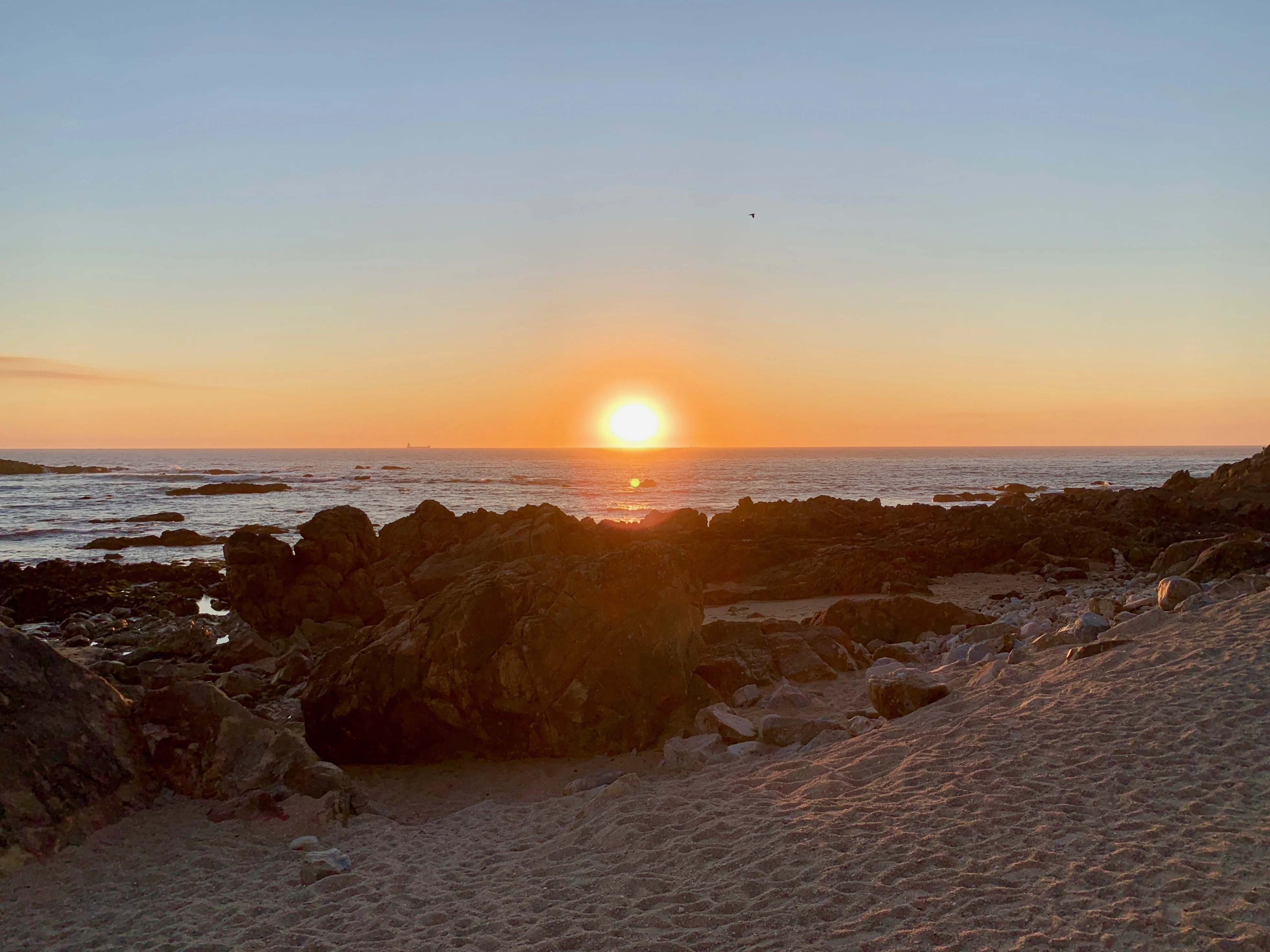 An incredible sunset over the ocean at Foz do Douro