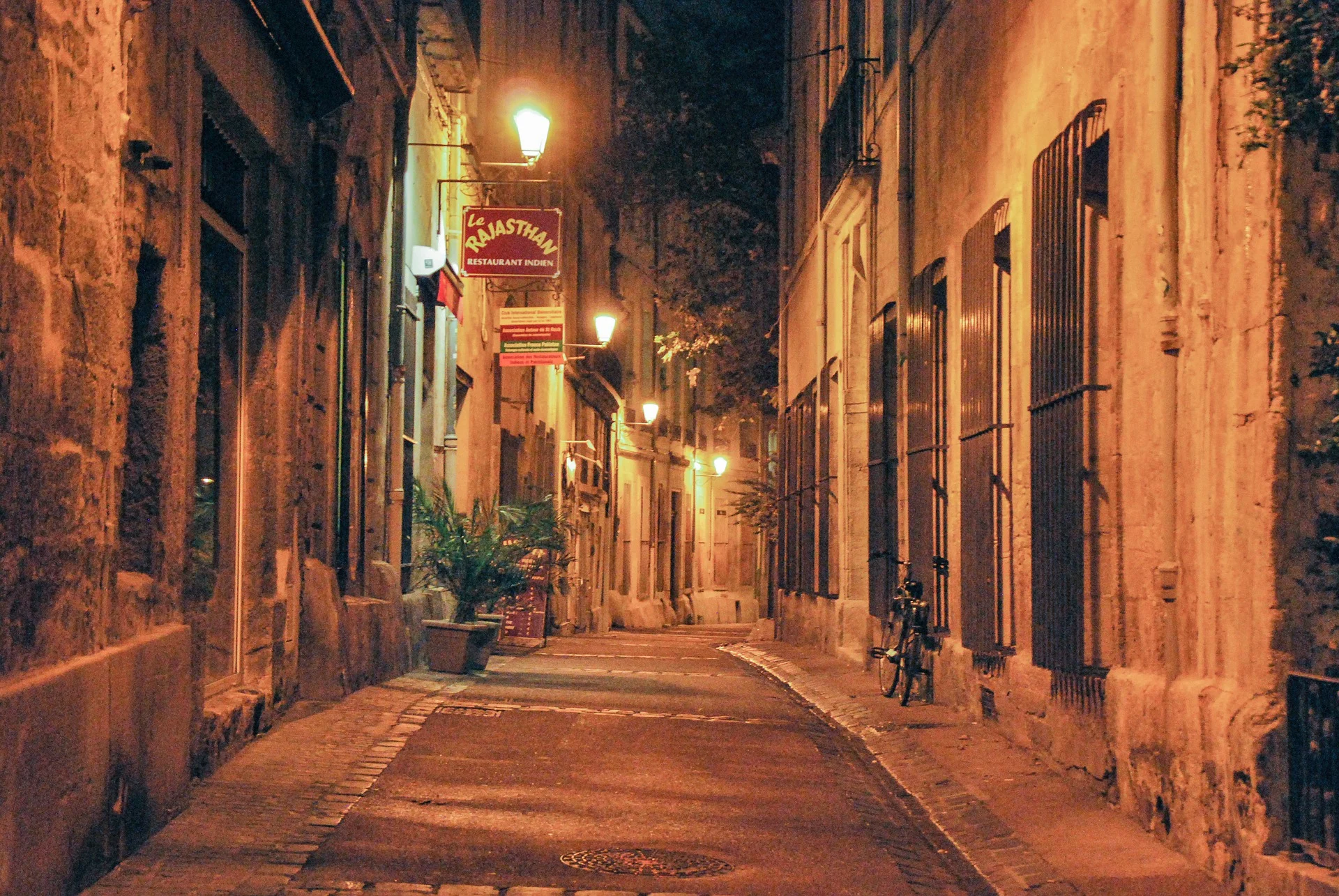 A narrow cobblestone street in Montpellier's city center