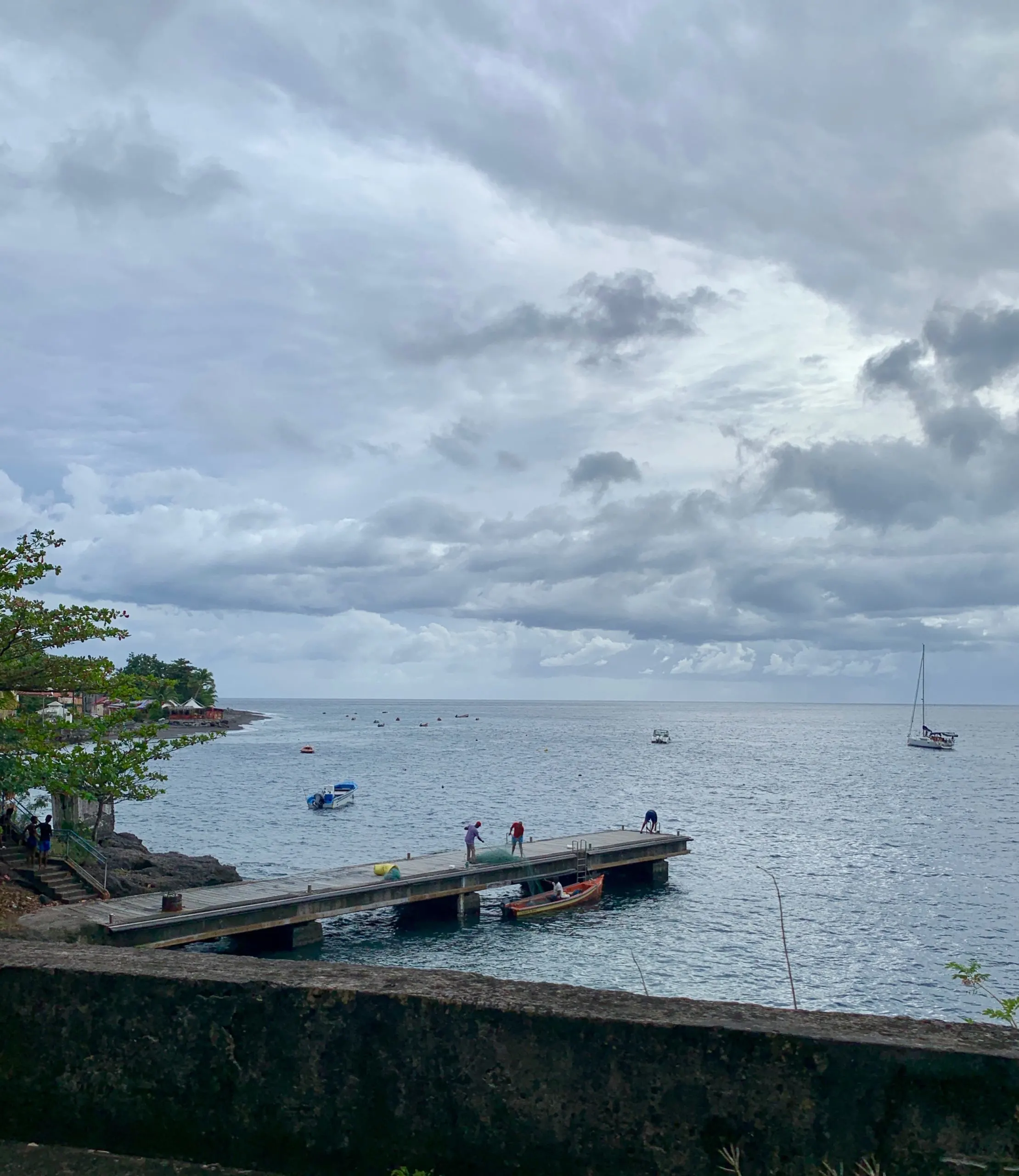 A cloudy day on a dock in Le Prêcheur