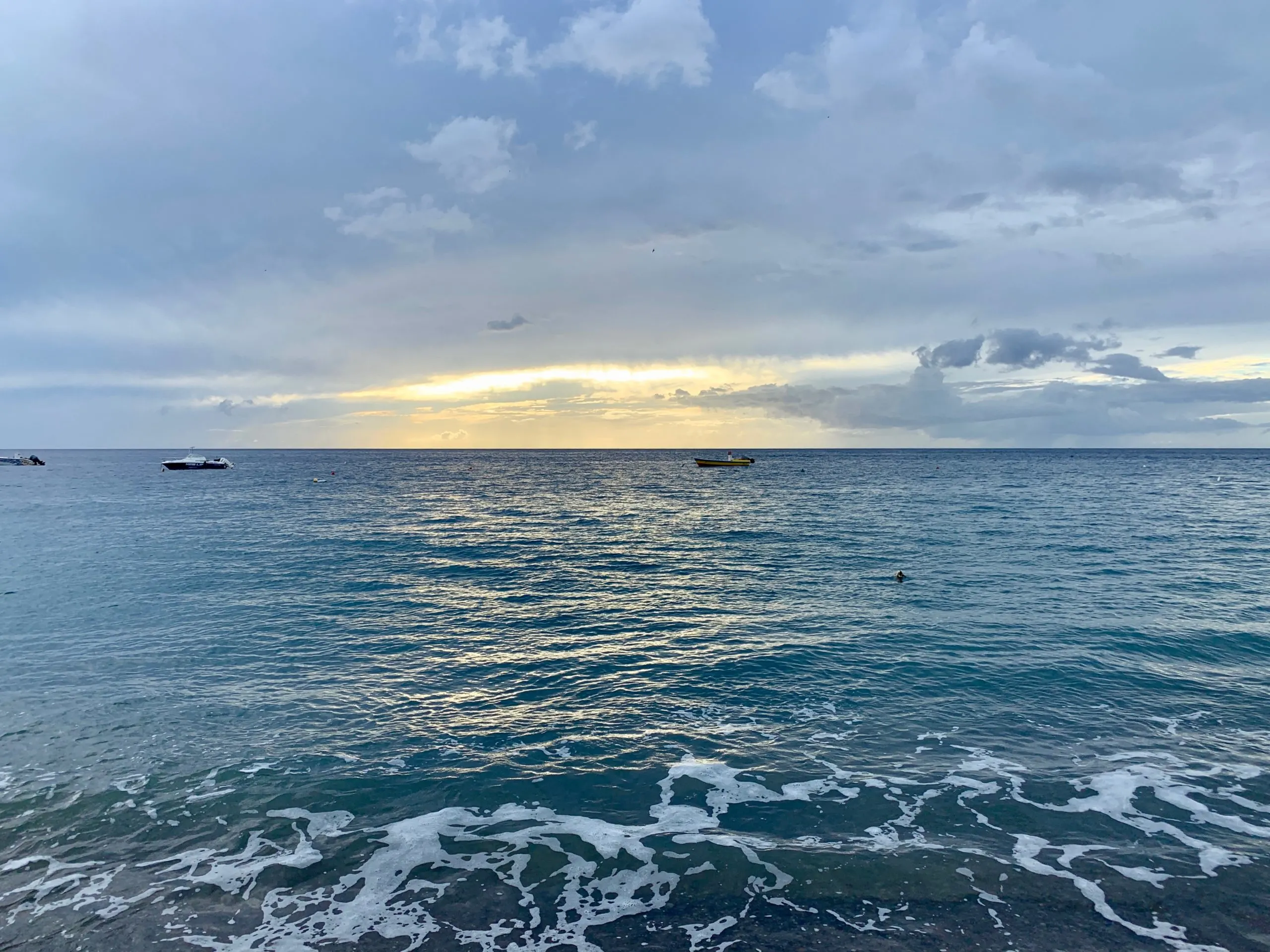 The sunset over the ocean in Le Carbet