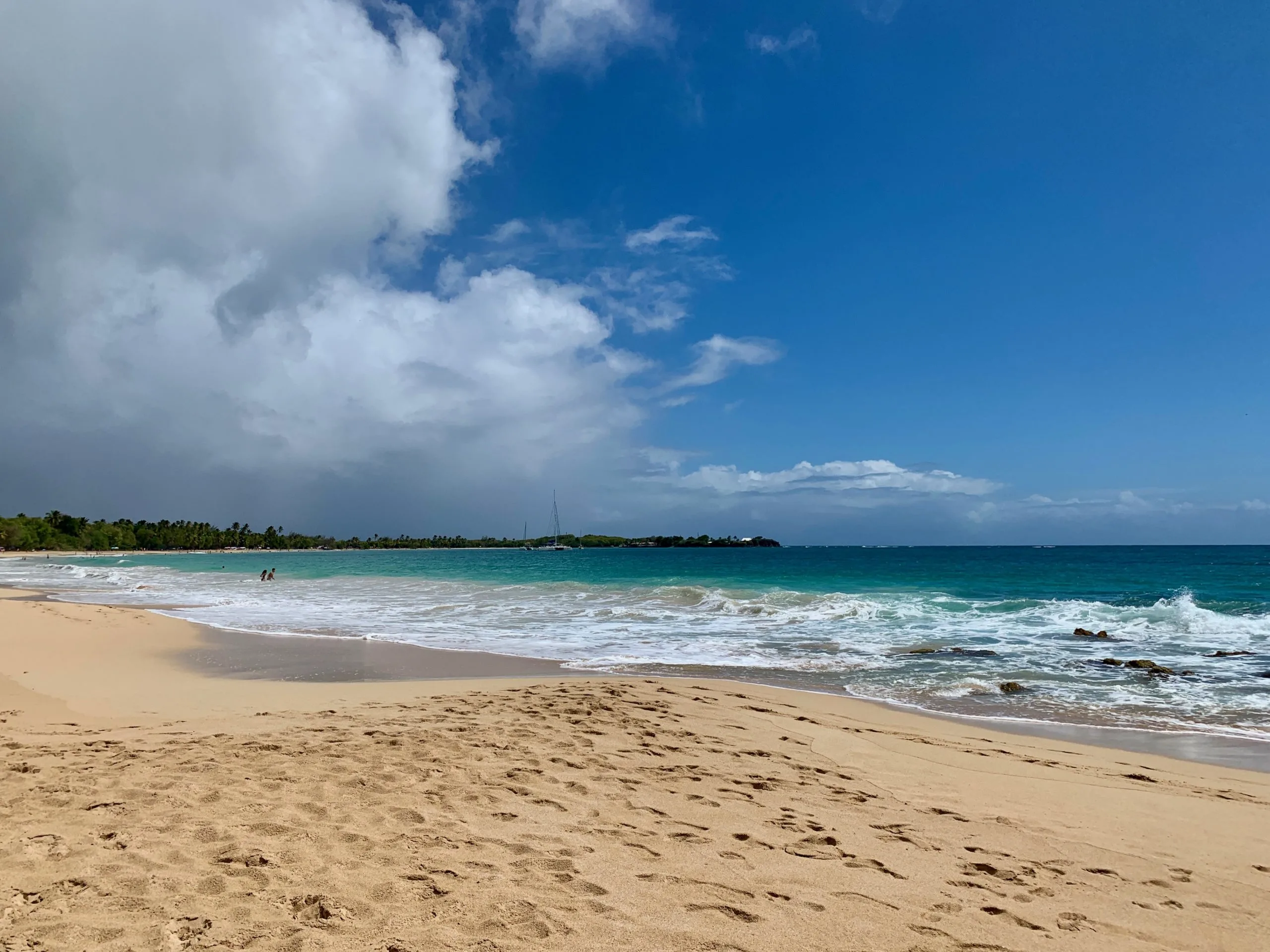 A half stormy/half blue sky over the ocean on Les Salines