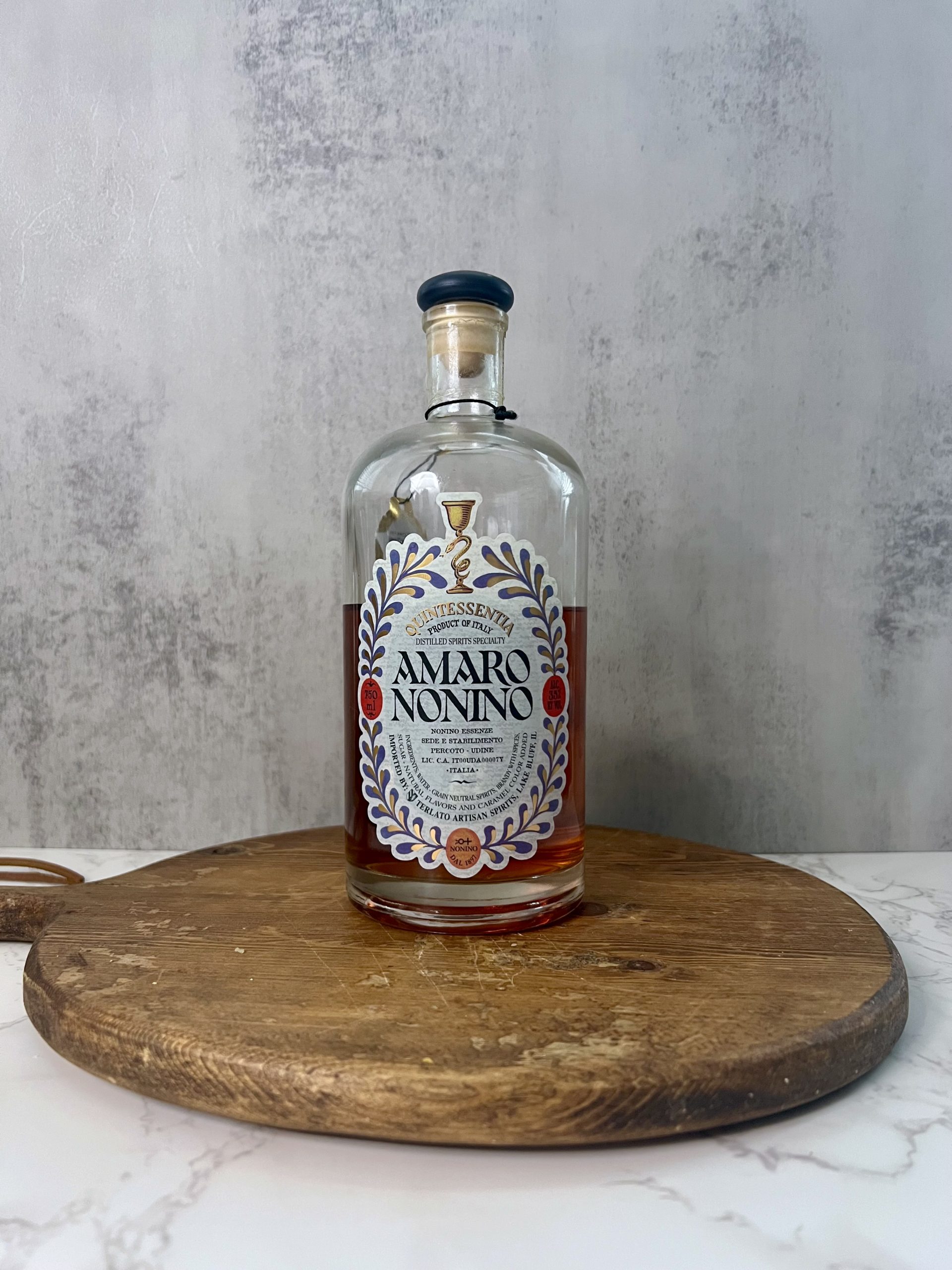 A bottle of Amaro Nonino on a countertop.